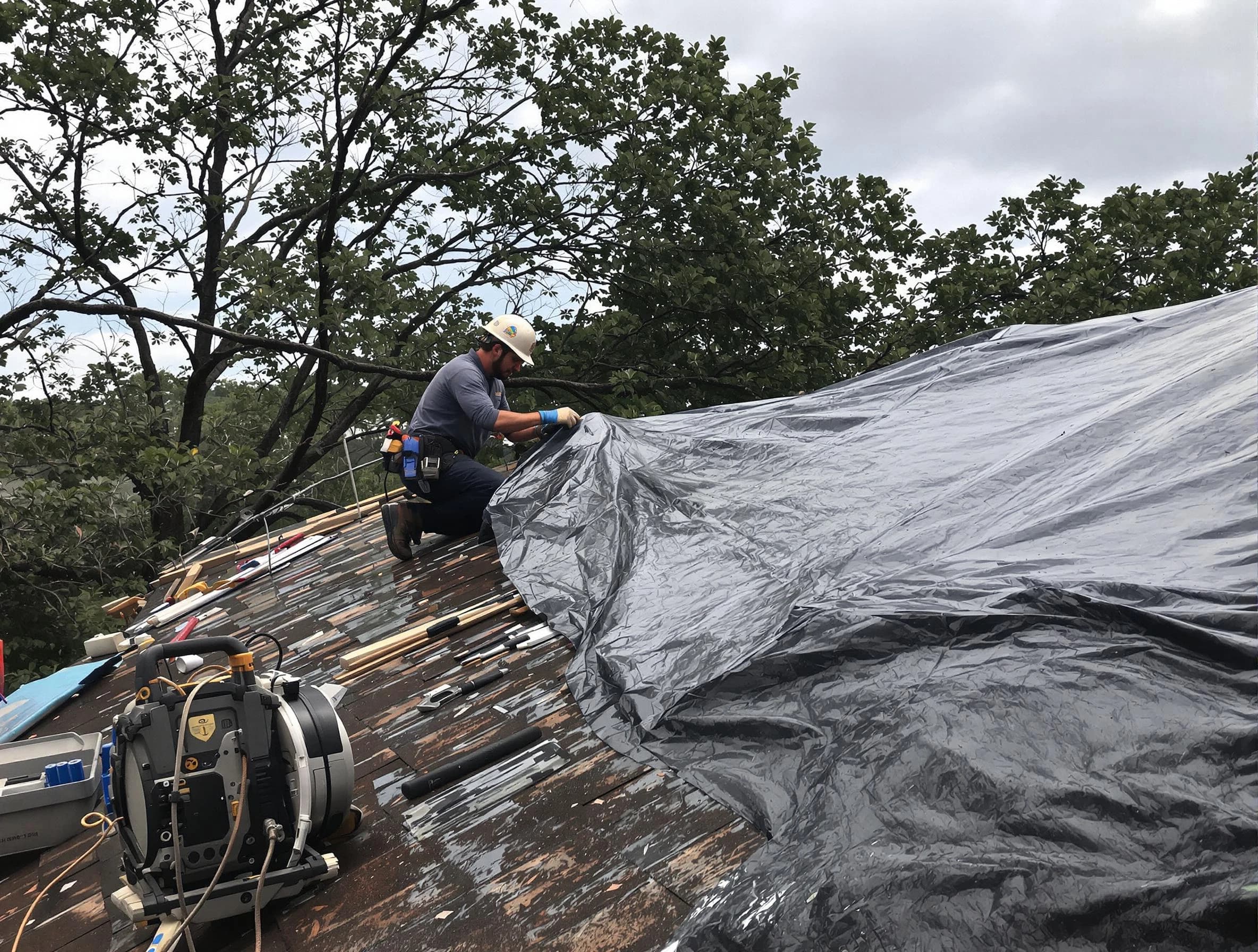 Parma Roofing Company responding to an emergency roof repair call in Parma, OH