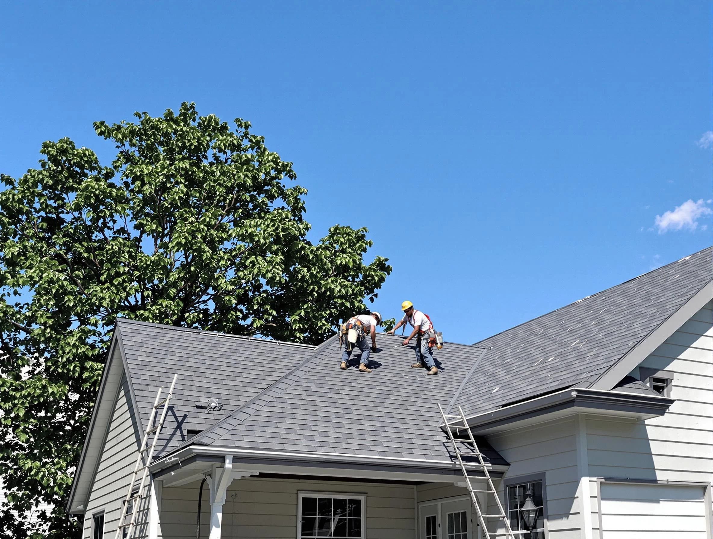 Parma Roofing Company crew finalizing a roof installation in Parma, OH